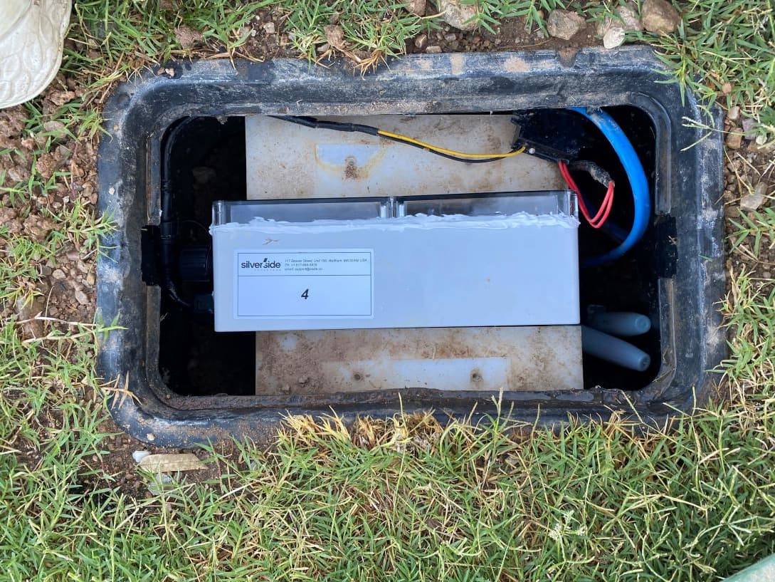 Inside a valve box — the Silverside sensor enclosure and its power and data wiring (node 4 of 30).